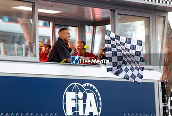 2024-05-26 - Kylian Mbappe of France with the checkered flag, drapeau during the Formula 1 Grand Prix de Monaco 2024, 8th round of the 2024 Formula One World Championship from May 23 to 26, 2024 on the Circuit de Monaco, in Monaco - F1 - MONACO GRAND PRIX 2024 - FORMULA 1 - MOTORS