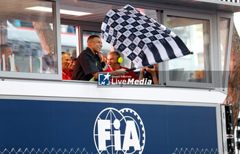 2024-05-26 - Kylian Mbappe of France with the checkered flag, drapeau during the Formula 1 Grand Prix de Monaco 2024, 8th round of the 2024 Formula One World Championship from May 23 to 26, 2024 on the Circuit de Monaco, in Monaco - F1 - MONACO GRAND PRIX 2024 - FORMULA 1 - MOTORS