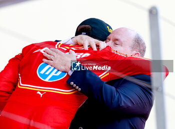 2024-05-26 - LECLERC Charles (mco), Scuderia Ferrari SF-24 and Albert II Grimaldi Prince of Monaco on podium with prince podium during the Formula 1 Grand Prix de Monaco 2024, 8th round of the 2024 Formula One World Championship from May 23 to 26, 2024 on the Circuit de Monaco, in Monaco - F1 - MONACO GRAND PRIX 2024 - FORMULA 1 - MOTORS