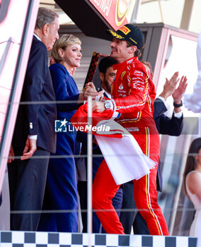 2024-05-26 - Princess of Monaco Charlène Lynette and LECLERC Charles (mco), Scuderia Ferrari SF-24, portrait on podium during the Formula 1 Grand Prix de Monaco 2024, 8th round of the 2024 Formula One World Championship from May 23 to 26, 2024 on the Circuit de Monaco, in Monaco - F1 - MONACO GRAND PRIX 2024 - FORMULA 1 - MOTORS