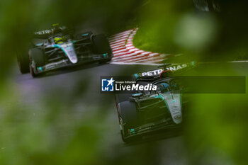 2024-06-07 - 63 RUSSELL George (gbr), Mercedes AMG F1 Team W15, action and 44 HAMILTON Lewis (gbr), Mercedes AMG F1 Team W15, action during the Formula 1 AWS Grand Prix du Canada 2024, 9th round of the 2024 Formula One World Championship from June 07 to 09, 2024 on the Circuit Gilles Villeneuve, in Montréal, Canada - F1 - CANADIAN GRAND PRIX 2024 - FORMULA 1 - MOTORS