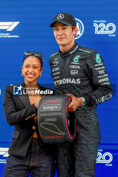 2024-06-08 - Pole sitte George Russell (GBR) - Mercedes-AMG PETRONAS F1 Team - Mercedes W15 - Mercedes E Performance and Elizabeth Shaila Koshy, youtuber 
during Formula 1 Aws Grand Prix du Canada 2024, Montreal, Quebec, Canada, from Jun 6th to 9th - Round 9 of 24 of 2024 F1 World Championship - FORMULA 1 AWS GRAND PRIX DU CANADA 2024 - FORMULA 1 - MOTORS