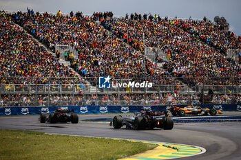 2024-06-09 - 04 NORRIS Lando (gbr), McLaren F1 Team MCL38, action 63 RUSSELL George (gbr), Mercedes AMG F1 Team W15, action 01 VERSTAPPEN Max (nld), Red Bull Racing RB20, action during the Formula 1 AWS Grand Prix du Canada 2024, 9th round of the 2024 Formula One World Championship from June 07 to 09, 2024 on the Circuit Gilles Villeneuve, in Montréal, Canada - F1 - CANADIAN GRAND PRIX 2024 - FORMULA 1 - MOTORS