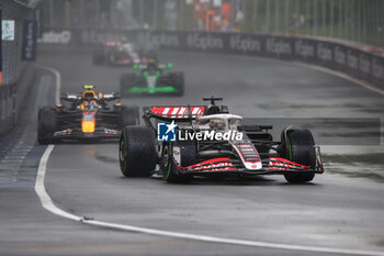 2024-06-09 - 20 MAGNUSSEN Kevin (den), Haas F1 Team VF-24 Ferrari, action 11 PEREZ Sergio (mex), Red Bull Racing RB20, action during the Formula 1 AWS Grand Prix du Canada 2024, 9th round of the 2024 Formula One World Championship from June 07 to 09, 2024 on the Circuit Gilles Villeneuve, in Montréal, Canada - F1 - CANADIAN GRAND PRIX 2024 - FORMULA 1 - MOTORS