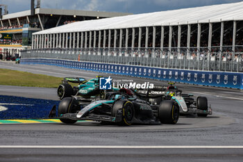 2024-06-09 - 63 RUSSELL George (gbr), Mercedes AMG F1 Team W15, action 44 HAMILTON Lewis (gbr), Mercedes AMG F1 Team W15, action 14 ALONSO Fernando (spa), Aston Martin F1 Team AMR24, action during the Formula 1 AWS Grand Prix du Canada 2024, 9th round of the 2024 Formula One World Championship from June 07 to 09, 2024 on the Circuit Gilles Villeneuve, in Montréal, Canada - F1 - CANADIAN GRAND PRIX 2024 - FORMULA 1 - MOTORS