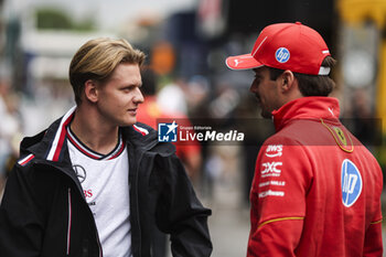 2024-06-20 - SCHUMACHER Mick (ger), Reserve Driver of Mercedes AMG F1 Team, portrait and LECLERC Charles (mco), Scuderia Ferrari SF-24, portrait during the Formula 1 Aramco Gran Premio de Espana 2024, 10th round of the 2024 Formula One World Championship from June 21 to 23, 2024 on the Circuit de Barcelona-Catalunya, in Montmeló, Spain - F1 - SPANISH GRAND PRIX 2024 - FORMULA 1 - MOTORS