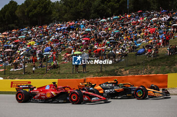 2024-06-22 - 16 LECLERC Charles (mco), Scuderia Ferrari SF-24, action 04 NORRIS Lando (gbr), McLaren F1 Team MCL38, action during the Formula 1 Aramco Gran Premio de Espana 2024, 10th round of the 2024 Formula One World Championship from June 21 to 23, 2024 on the Circuit de Barcelona-Catalunya, in Montmeló, Spain - F1 - SPANISH GRAND PRIX 2024 - FORMULA 1 - MOTORS