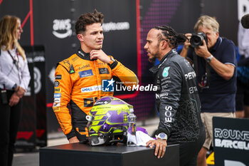 2024-06-22 - NORRIS Lando (gbr), McLaren F1 Team MCL38, HAMILTON Lewis (gbr), Mercedes AMG F1 Team W15, portrait during the Formula 1 Aramco Gran Premio de Espana 2024, 10th round of the 2024 Formula One World Championship from June 21 to 23, 2024 on the Circuit de Barcelona-Catalunya, in Montmeló, Spain - F1 - SPANISH GRAND PRIX 2024 - FORMULA 1 - MOTORS