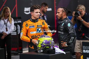 2024-06-22 - NORRIS Lando (gbr), McLaren F1 Team MCL38, HAMILTON Lewis (gbr), Mercedes AMG F1 Team W15, portrait during the Formula 1 Aramco Gran Premio de Espana 2024, 10th round of the 2024 Formula One World Championship from June 21 to 23, 2024 on the Circuit de Barcelona-Catalunya, in Montmeló, Spain - F1 - SPANISH GRAND PRIX 2024 - FORMULA 1 - MOTORS