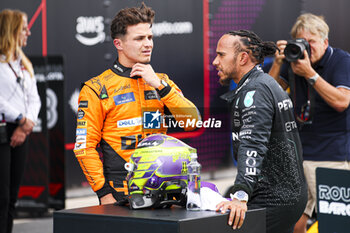 2024-06-22 - NORRIS Lando (gbr), McLaren F1 Team MCL38, portrait and HAMILTON Lewis (gbr), Mercedes AMG F1 Team W15, portrait during the Formula 1 Aramco Gran Premio de Espana 2024, 10th round of the 2024 Formula One World Championship from June 21 to 23, 2024 on the Circuit de Barcelona-Catalunya, in Montmeló, Spain - F1 - SPANISH GRAND PRIX 2024 - FORMULA 1 - MOTORS