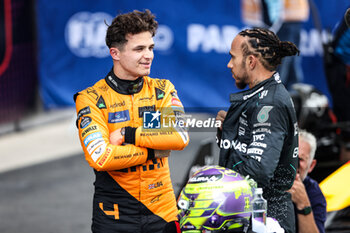 2024-06-22 - NORRIS Lando (gbr), McLaren F1 Team MCL38, portrait HAMILTON Lewis (gbr), Mercedes AMG F1 Team W15, portrait during the Formula 1 Aramco Gran Premio de Espana 2024, 10th round of the 2024 Formula One World Championship from June 21 to 23, 2024 on the Circuit de Barcelona-Catalunya, in Montmeló, Spain - F1 - SPANISH GRAND PRIX 2024 - FORMULA 1 - MOTORS