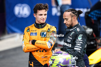 2024-06-22 - NORRIS Lando (gbr), McLaren F1 Team MCL38, portrait HAMILTON Lewis (gbr), Mercedes AMG F1 Team W15, portrait during the Formula 1 Aramco Gran Premio de Espana 2024, 10th round of the 2024 Formula One World Championship from June 21 to 23, 2024 on the Circuit de Barcelona-Catalunya, in Montmeló, Spain - F1 - SPANISH GRAND PRIX 2024 - FORMULA 1 - MOTORS