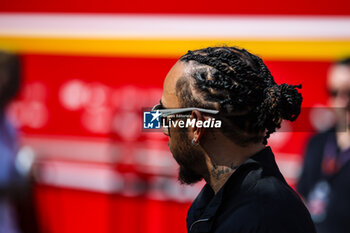 2024-06-29 - HAMILTON Lewis (gbr), Mercedes AMG F1 Team W15, portrait crossing in front of Scuderia Ferrari motorhome during the Formula 1 Qatar Airways Austrian Grand Prix 2024, 11th round of the 2024 Formula One World Championship from June 28 to 30, 2024 on the Red Bull Ring, in Spielberg, Austria - F1 - AUSTRIAN GRAND PRIX 2024 - FORMULA 1 - MOTORS