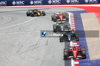 2024-06-29 - 55 SAINZ Carlos (spa), Scuderia Ferrari SF-24, action 63 RUSSELL George (gbr), Mercedes AMG F1 Team W15, action 44 HAMILTON Lewis (gbr), Mercedes AMG F1 Team W15, action during the Formula 1 Qatar Airways Austrian Grand Prix 2024, 11th round of the 2024 Formula One World Championship from June 28 to 30, 2024 on the Red Bull Ring, in Spielberg, Austria - F1 - AUSTRIAN GRAND PRIX 2024 - FORMULA 1 - MOTORS