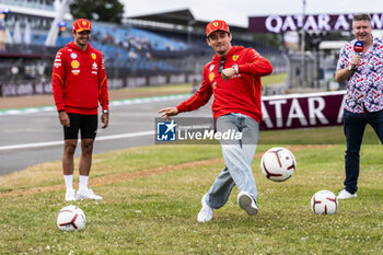 2024-07-05 - Charles Leclerc (MON) Carlos Sainz Jr. (ESP) - Scuderia Ferrari - Ferrari SF-24 - Ferrari playing football on day 1, thursday july 4, 2024 of the formula 1 qatar airways british grand prix 2024, scheduled to take place at the silverstone circuit from july 5 to july 7, 2024 - FORMULA 1 - QATAR AIRWAYS BRITISHGRAND PRIX 2024 - PRACTICE - FORMULA 1 - MOTORS