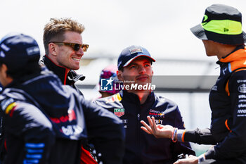 2024-07-07 - Nico Hulkenberg (GER) - MoneyGram Haas F1 Team - Haas VF-24 - Ferrari and Max Verstappen (NED) - Oracle Red Bull Racing - Red Bull RB20 - Honda RBPT during Race Day, on day 4, sunday july 7, 2024 of the formula 1 qatar airways british grand prix 2024, scheduled to take place at the silverstone circuit from july 5 to july 7, 2024 - FORMULA 1 - QATAR AIRWAYS BRITISHGRAND PRIX 2024 - RACE - FORMULA 1 - MOTORS