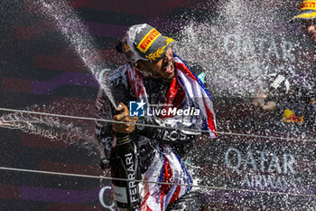 2024-07-07 - Lewis Hamilton (GBR) - Mercedes-AMG PETRONAS F1 Team - Mercedes W15 - Mercedes E Performance on the podium after winning the Race on day 4, Sunday july 7, 2024 of the formula 1 qatar airways british grand prix 2024, scheduled to take place at the silverstone circuit from july 5 to july 7, 2024 - FORMULA 1 - QATAR AIRWAYS BRITISHGRAND PRIX 2024 - RACE - FORMULA 1 - MOTORS