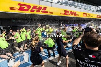 2024-07-07 - Mercedes-AMG Petronas F1 Team celebrating the victory o Lewis Hamilton (GBR) - Mercedes-AMG PETRONAS F1 Team - Mercedes W15 - Mercedes E Performance after the Race on day 4, Sunday july 7, 2024 of the formula 1 qatar airways british grand prix 2024, scheduled to take place at the silverstone circuit from july 5 to july 7, 2024 - FORMULA 1 - QATAR AIRWAYS BRITISHGRAND PRIX 2024 - RACE - FORMULA 1 - MOTORS