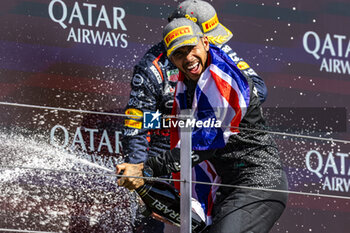 2024-07-07 - Lewis Hamilton (GBR) - Mercedes-AMG PETRONAS F1 Team - Mercedes W15 - Mercedes E Performance on the podium after winning the Race on day 4, Sunday july 7, 2024 of the formula 1 qatar airways british grand prix 2024, scheduled to take place at the silverstone circuit from july 5 to july 7, 2024 - FORMULA 1 - QATAR AIRWAYS BRITISHGRAND PRIX 2024 - RACE - FORMULA 1 - MOTORS