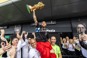 2024-07-07 - Mercedes-AMG Petronas F1 Team celebrating the victory o Lewis Hamilton (GBR) - Mercedes-AMG PETRONAS F1 Team - Mercedes W15 - Mercedes E Performance after the Race on day 4, Sunday july 7, 2024 of the formula 1 qatar airways british grand prix 2024, scheduled to take place at the silverstone circuit from july 5 to july 7, 2024 - FORMULA 1 - QATAR AIRWAYS BRITISHGRAND PRIX 2024 - RACE - FORMULA 1 - MOTORS