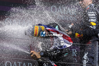 2024-07-07 - Lewis Hamilton (GBR) - Mercedes-AMG PETRONAS F1 Team - Mercedes W15 - Mercedes E Performance on the podium after winning the Race on day 4, Sunday july 7, 2024 of the formula 1 qatar airways british grand prix 2024, scheduled to take place at the silverstone circuit from july 5 to july 7, 2024 - FORMULA 1 - QATAR AIRWAYS BRITISHGRAND PRIX 2024 - RACE - FORMULA 1 - MOTORS