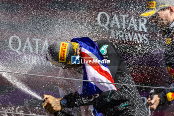 2024-07-07 - Lewis Hamilton (GBR) - Mercedes-AMG PETRONAS F1 Team - Mercedes W15 - Mercedes E Performance on the podium after winning the Race on day 4, Sunday july 7, 2024 of the formula 1 qatar airways british grand prix 2024, scheduled to take place at the silverstone circuit from july 5 to july 7, 2024 - FORMULA 1 - QATAR AIRWAYS BRITISHGRAND PRIX 2024 - RACE - FORMULA 1 - MOTORS