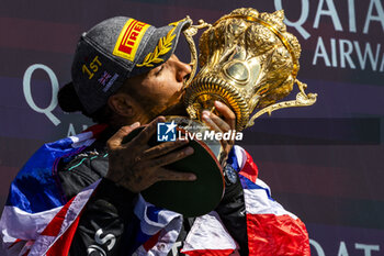 2024-07-07 - Lewis Hamilton (GBR) - Mercedes-AMG PETRONAS F1 Team - Mercedes W15 - Mercedes E Performance on the podium after winning the Race on day 4, Sunday july 7, 2024 of the formula 1 qatar airways british grand prix 2024, scheduled to take place at the silverstone circuit from july 5 to july 7, 2024 - FORMULA 1 - QATAR AIRWAYS BRITISHGRAND PRIX 2024 - RACE - FORMULA 1 - MOTORS