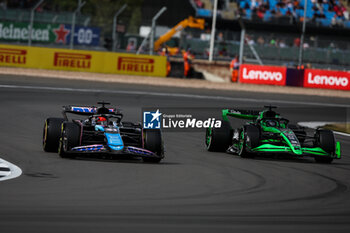 2024-07-05 - 31 OCON Esteban (fra), Alpine F1 Team A524, action 77 BOTTAS Valtteri (fin), Stake F1 Team Kick Sauber C44, action during the Formula 1 Qatar Airways British Grand Prix 2024, 12th round of the 2024 Formula One World Championship from July 5 to 7, 2024 on the Silverstone Circuit, in Silverstone, United Kingdom - F1 - BRITISH GRAND PRIX 2024 - FORMULA 1 - MOTORS