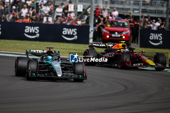 2024-07-05 - 63 RUSSELL George (gbr), Mercedes AMG F1 Team W15, action 11 PEREZ Sergio (mex), Red Bull Racing RB20, action during the Formula 1 Qatar Airways British Grand Prix 2024, 12th round of the 2024 Formula One World Championship from July 5 to 7, 2024 on the Silverstone Circuit, in Silverstone, United Kingdom - F1 - BRITISH GRAND PRIX 2024 - FORMULA 1 - MOTORS