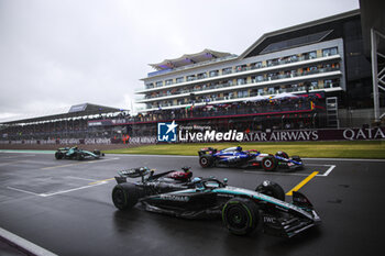 2024-07-06 - 63 RUSSELL George (gbr), Mercedes AMG F1 Team W15, action and 22 TSUNODA Yuki (jap), Visa Cash App RB F1 Team VCARB 01, action start practice during the Formula 1 Qatar Airways British Grand Prix 2024, 12th round of the 2024 Formula One World Championship from July 5 to 7, 2024 on the Silverstone Circuit, in Silverstone, United Kingdom - F1 - BRITISH GRAND PRIX 2024 - FORMULA 1 - MOTORS