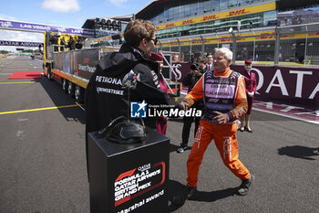 2024-07-07 - FIA marshall, commissaire de piste, marshal, marshalls, marshals award portrait RUSSELL George (gbr), Mercedes AMG F1 Team W15, portrait during the Formula 1 Qatar Airways British Grand Prix 2024, 12th round of the 2024 Formula One World Championship from July 5 to 7, 2024 on the Silverstone Circuit, in Silverstone, United Kingdom - F1 - BRITISH GRAND PRIX 2024 - FORMULA 1 - MOTORS