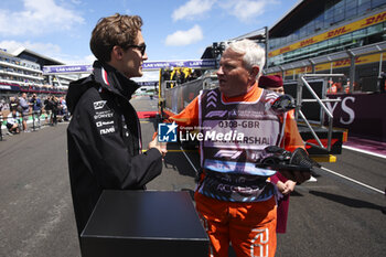 2024-07-07 - FIA marshall, commissaire de piste, marshal, marshalls, marshals award portrait RUSSELL George (gbr), Mercedes AMG F1 Team W15, portrait during the Formula 1 Qatar Airways British Grand Prix 2024, 12th round of the 2024 Formula One World Championship from July 5 to 7, 2024 on the Silverstone Circuit, in Silverstone, United Kingdom - F1 - BRITISH GRAND PRIX 2024 - FORMULA 1 - MOTORS