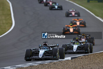 2024-07-07 - 63 RUSSELL George (gbr), Mercedes AMG F1 Team W15, 44 HAMILTON Lewis (gbr), Mercedes AMG F1 Team W15, action during the Formula 1 Qatar Airways British Grand Prix 2024, 12th round of the 2024 Formula One World Championship from July 5 to 7, 2024 on the Silverstone Circuit, in Silverstone, United Kingdom - F1 - BRITISH GRAND PRIX 2024 - FORMULA 1 - MOTORS