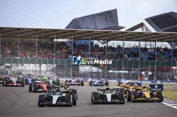 2024-07-07 - 44 HAMILTON Lewis (gbr), Mercedes AMG F1 Team W15, 63 RUSSELL George (gbr), Mercedes AMG F1 Team W15, 04 NORRIS Lando (gbr), McLaren F1 Team MCL38, action, start of the race, depart, during the Formula 1 Qatar Airways British Grand Prix 2024, 12th round of the 2024 Formula One World Championship from July 5 to 7, 2024 on the Silverstone Circuit, in Silverstone, United Kingdom - F1 - BRITISH GRAND PRIX 2024 - FORMULA 1 - MOTORS