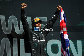 2024-07-07 - HAMILTON Lewis (gbr), Mercedes AMG F1 Team W15, portrait celebration victory podium during the Formula 1 Qatar Airways British Grand Prix 2024, 12th round of the 2024 Formula One World Championship from July 5 to 7, 2024 on the Silverstone Circuit, in Silverstone, United Kingdom - F1 - BRITISH GRAND PRIX 2024 - FORMULA 1 - MOTORS