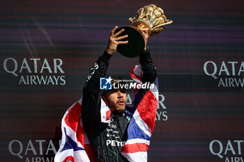 2024-07-07 - HAMILTON Lewis (gbr), Mercedes AMG F1 Team W15, portrait celebration victory podium trophy during the Formula 1 Qatar Airways British Grand Prix 2024, 12th round of the 2024 Formula One World Championship from July 5 to 7, 2024 on the Silverstone Circuit, in Silverstone, United Kingdom - F1 - BRITISH GRAND PRIX 2024 - FORMULA 1 - MOTORS