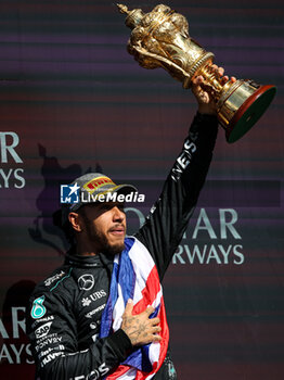 2024-07-07 - HAMILTON Lewis (gbr), Mercedes AMG F1 Team W15, portrait celebration victory podium trophy during the Formula 1 Qatar Airways British Grand Prix 2024, 12th round of the 2024 Formula One World Championship from July 5 to 7, 2024 on the Silverstone Circuit, in Silverstone, United Kingdom - F1 - BRITISH GRAND PRIX 2024 - FORMULA 1 - MOTORS