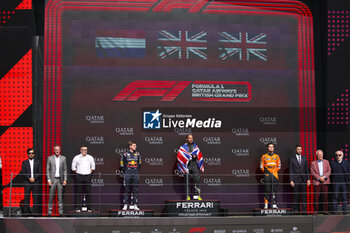 2024-07-07 - VERSTAPPEN Max (ned), Red Bull Racing RB20, portrait, HAMILTON Lewis (gbr), Mercedes AMG F1 Team W15, portrait and NORRIS Lando (gbr), McLaren F1 Team MCL38, portrait podium during the Formula 1 Qatar Airways British Grand Prix 2024, 12th round of the 2024 Formula One World Championship from July 5 to 7, 2024 on the Silverstone Circuit, in Silverstone, United Kingdom - F1 - BRITISH GRAND PRIX 2024 - FORMULA 1 - MOTORS