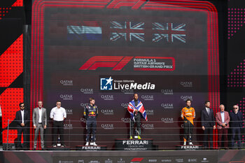 2024-07-07 - VERSTAPPEN Max (ned), Red Bull Racing RB20, portrait, HAMILTON Lewis (gbr), Mercedes AMG F1 Team W15, portrait and NORRIS Lando (gbr), McLaren F1 Team MCL38, portrait podium during the Formula 1 Qatar Airways British Grand Prix 2024, 12th round of the 2024 Formula One World Championship from July 5 to 7, 2024 on the Silverstone Circuit, in Silverstone, United Kingdom - F1 - BRITISH GRAND PRIX 2024 - FORMULA 1 - MOTORS