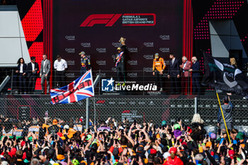 2024-07-07 - Podium: HAMILTON Lewis (gbr), Mercedes AMG F1 Team W15, VERSTAPPEN Max (ned), Red Bull Racing RB20, NORRIS Lando (gbr), McLaren F1 Team MCL38, BEN SULAYEM Mohammed (uae), President of the FIA, during the Formula 1 Qatar Airways British Grand Prix 2024, 12th round of the 2024 Formula One World Championship from July 5 to 7, 2024 on the Silverstone Circuit, in Silverstone, United Kingdom - F1 - BRITISH GRAND PRIX 2024 - FORMULA 1 - MOTORS