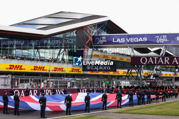 2024-07-07 - starting grid national athem illustration during the Formula 1 Qatar Airways British Grand Prix 2024, 12th round of the 2024 Formula One World Championship from July 5 to 7, 2024 on the Silverstone Circuit, in Silverstone, United Kingdom - F1 - BRITISH GRAND PRIX 2024 - FORMULA 1 - MOTORS