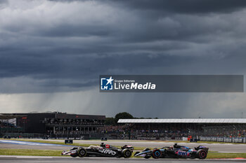 2024-07-07 - 20 MAGNUSSEN Kevin (den), Haas F1 Team VF-24 Ferrari, action 31 OCON Esteban (fra), Alpine F1 Team A524, action during the Formula 1 Qatar Airways British Grand Prix 2024, 12th round of the 2024 Formula One World Championship from July 5 to 7, 2024 on the Silverstone Circuit, in Silverstone, United Kingdom - F1 - BRITISH GRAND PRIX 2024 - FORMULA 1 - MOTORS