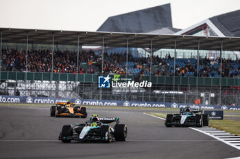 2024-07-07 - 63 RUSSELL George (gbr), Mercedes AMG F1 Team W15, action 44 HAMILTON Lewis (gbr), Mercedes AMG F1 Team W15, action 04 NORRIS Lando (gbr), McLaren F1 Team MCL38, action during the Formula 1 Qatar Airways British Grand Prix 2024, 12th round of the 2024 Formula One World Championship from July 5 to 7, 2024 on the Silverstone Circuit, in Silverstone, United Kingdom - F1 - BRITISH GRAND PRIX 2024 - FORMULA 1 - MOTORS