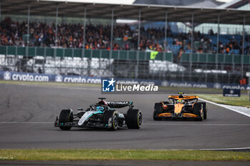 2024-07-07 - 63 RUSSELL George (gbr), Mercedes AMG F1 Team W15, action 04 NORRIS Lando (gbr), McLaren F1 Team MCL38, action during the Formula 1 Qatar Airways British Grand Prix 2024, 12th round of the 2024 Formula One World Championship from July 5 to 7, 2024 on the Silverstone Circuit, in Silverstone, United Kingdom - F1 - BRITISH GRAND PRIX 2024 - FORMULA 1 - MOTORS