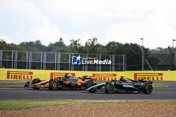 2024-07-07 - 81 PIASTRI Oscar (aus), McLaren F1 Team MCL38, action 63 RUSSELL George (gbr), Mercedes AMG F1 Team W15, action during the Formula 1 Qatar Airways British Grand Prix 2024, 12th round of the 2024 Formula One World Championship from July 5 to 7, 2024 on the Silverstone Circuit, in Silverstone, United Kingdom - F1 - BRITISH GRAND PRIX 2024 - FORMULA 1 - MOTORS