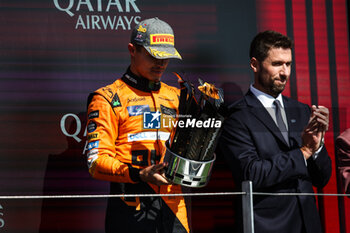 2024-07-07 - NORRIS Lando (gbr), McLaren F1 Team MCL38, portrait celebration podium trophy during the Formula 1 Qatar Airways British Grand Prix 2024, 12th round of the 2024 Formula One World Championship from July 5 to 7, 2024 on the Silverstone Circuit, in Silverstone, United Kingdom - F1 - BRITISH GRAND PRIX 2024 - FORMULA 1 - MOTORS