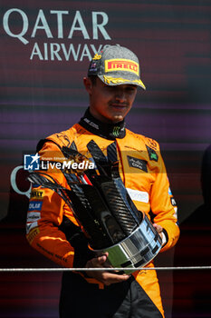 2024-07-07 - NORRIS Lando (gbr), McLaren F1 Team MCL38, portrait celebration podium trophy during the Formula 1 Qatar Airways British Grand Prix 2024, 12th round of the 2024 Formula One World Championship from July 5 to 7, 2024 on the Silverstone Circuit, in Silverstone, United Kingdom - F1 - BRITISH GRAND PRIX 2024 - FORMULA 1 - MOTORS