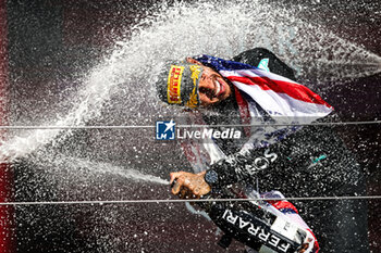 2024-07-07 - HAMILTON Lewis (gbr), Mercedes AMG F1 Team W15, portrait celebration podium with Ferrari champagne during the Formula 1 Qatar Airways British Grand Prix 2024, 12th round of the 2024 Formula One World Championship from July 5 to 7, 2024 on the Silverstone Circuit, in Silverstone, United Kingdom - F1 - BRITISH GRAND PRIX 2024 - FORMULA 1 - MOTORS