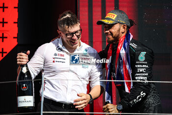 2024-07-07 - Peter 'Bono' Bonnington, senior race engineer for Lewis Hamilton HAMILTON Lewis (gbr), Mercedes AMG F1 Team W15, portrait celebration podium with Ferrari champagne during the Formula 1 Qatar Airways British Grand Prix 2024, 12th round of the 2024 Formula One World Championship from July 5 to 7, 2024 on the Silverstone Circuit, in Silverstone, United Kingdom - F1 - BRITISH GRAND PRIX 2024 - FORMULA 1 - MOTORS