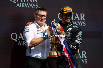 2024-07-07 - Peter 'Bono' Bonnington, senior race engineer for Lewis Hamilton HAMILTON Lewis (gbr), Mercedes AMG F1 Team W15, portrait celebration podium with Ferrari champagne during the Formula 1 Qatar Airways British Grand Prix 2024, 12th round of the 2024 Formula One World Championship from July 5 to 7, 2024 on the Silverstone Circuit, in Silverstone, United Kingdom - F1 - BRITISH GRAND PRIX 2024 - FORMULA 1 - MOTORS